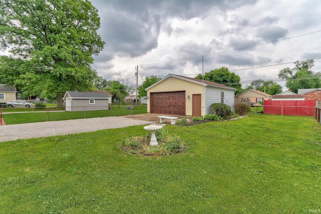 2305 E Virginia St, Evansville, IN 47711 - view of yard with a garage and an outdoor structure