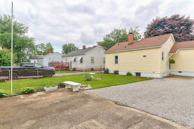 2305 E Virginia St, Evansville, IN 47711 - back of house featuring central AC