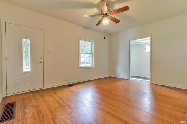 2305 E Virginia St, Evansville, IN 47711 - foyer entrance featuring light wood-type flooring, ceiling fan, and baseboards