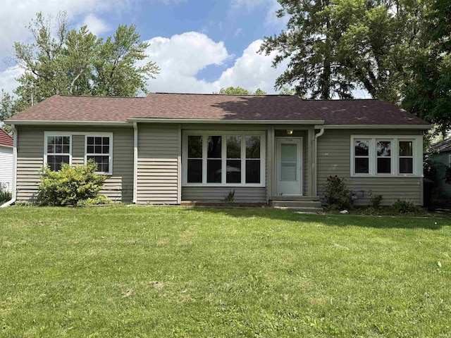 3104 W Amherst Rd, Muncie, IN 47304 - ranch-style house with a front lawn and a shingled roof