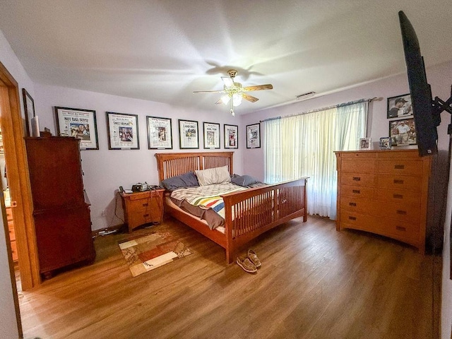 204 Coronet St, Angola, IN 46703 - bedroom featuring wood finished floors and ceiling fan