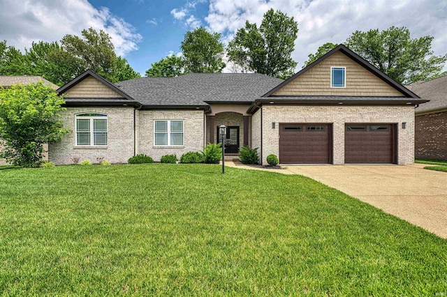 4308 Martha Ct, Newburgh, IN 47630 - craftsman-style home with concrete driveway, brick siding, a front yard, and an attached garage