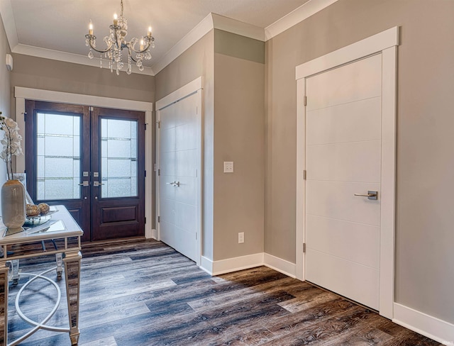 4308 Martha Ct, Newburgh, IN 47630 - entrance foyer featuring french doors, ornamental molding, a chandelier, dark wood-style flooring, and baseboards