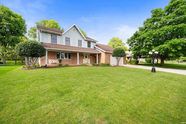 4400 W Friar Dr, Muncie, IN 47304 - view of front of home featuring concrete driveway, an attached garage, a front lawn, and a porch