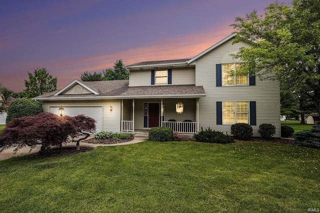 50576 W Park Ln, Granger, IN 46530 - traditional-style house with covered porch, a garage, a front lawn, and a shingled roof