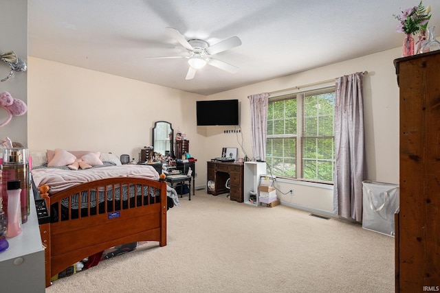 50576 W Park Ln, Granger, IN 46530 - carpeted bedroom with a ceiling fan and baseboards