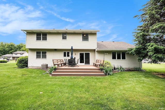 50576 W Park Ln, Granger, IN 46530 - back of house with a deck, a yard, and central air condition unit