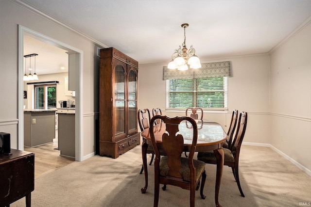 50576 W Park Ln, Granger, IN 46530 - dining area with a chandelier, light carpet, crown molding, and baseboards
