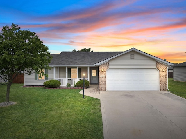 830 S Sommerset Trl, Columbia City, IN 46725 - ranch-style house featuring a porch, an attached garage, driveway, and brick siding
