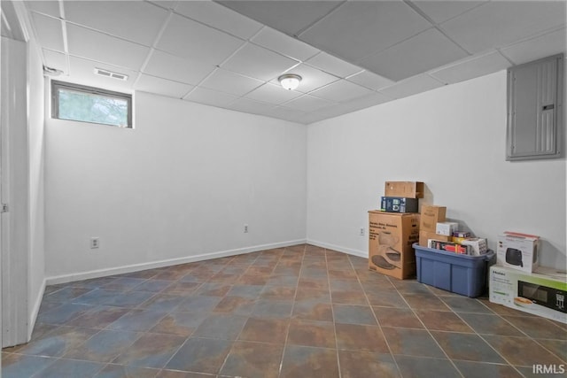 1010 W Sycamore St, Kokomo, IN 46901 - basement featuring electric panel, a paneled ceiling, and baseboards
