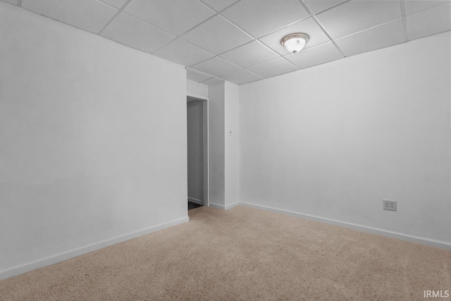 1010 W Sycamore St, Kokomo, IN 46901 - spare room featuring a drop ceiling, carpet floors, and baseboards