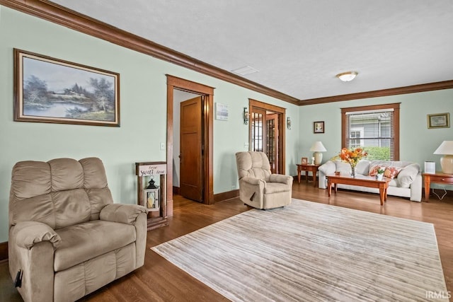 1010 W Sycamore St, Kokomo, IN 46901 - living room with wood finished floors, crown molding, and baseboards