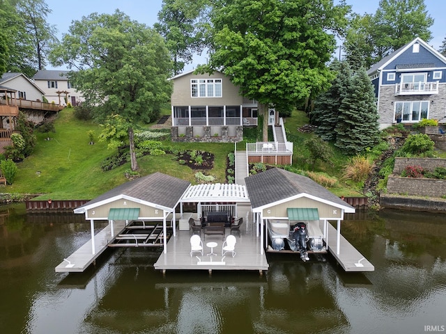 8818 N 1132 W, Monticello, IN 47960 - dock featuring boat lift, a water view, a yard, and stairway