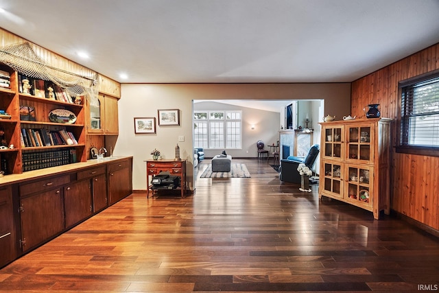 8818 N 1132 W, Monticello, IN 47960 - home office with wood walls, hardwood / wood-style floors, a fireplace, and baseboards