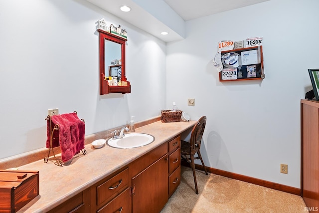 8818 N 1132 W, Monticello, IN 47960 - bathroom with vanity, baseboards, and recessed lighting
