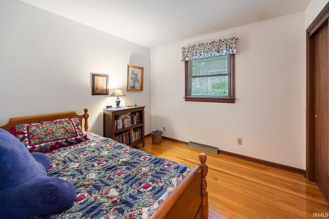 8818 N 1132 W, Monticello, IN 47960 - bedroom with light wood-type flooring and baseboards