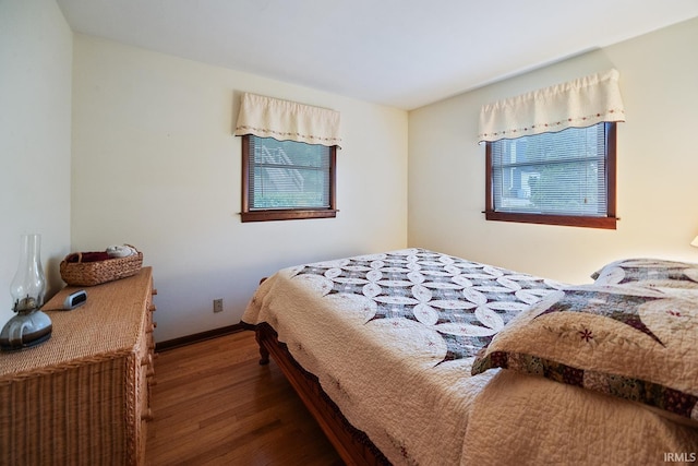 8818 N 1132 W, Monticello, IN 47960 - bedroom featuring wood finished floors and baseboards
