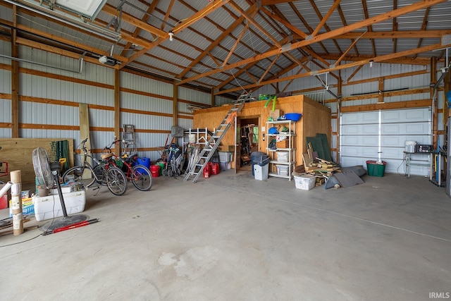 8818 N 1132 W, Monticello, IN 47960 - garage featuring metal wall and a garage door opener