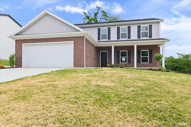 5582 Hillside Trl, Newburgh, IN 47630 - view of front of house featuring board and batten siding, driveway, a front yard, and an attached garage