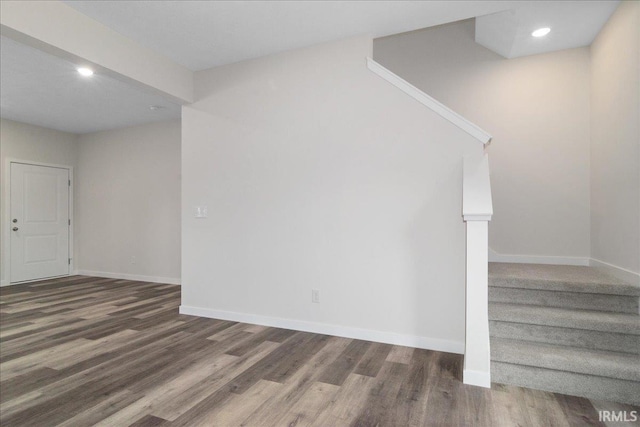 5582 Hillside Trl, Newburgh, IN 47630 - staircase with wood finished floors, baseboards, and recessed lighting