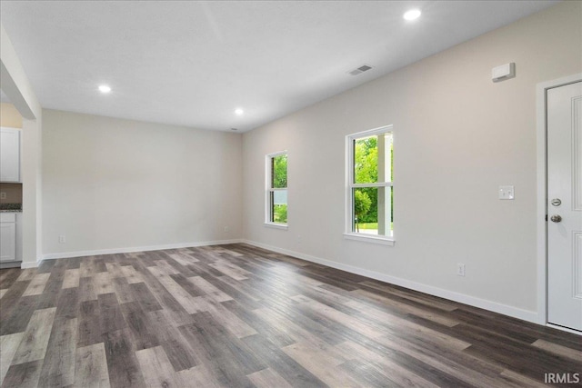 5582 Hillside Trl, Newburgh, IN 47630 - unfurnished living room with wood finished floors, recessed lighting, and baseboards