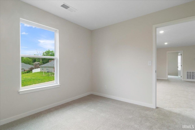 5582 Hillside Trl, Newburgh, IN 47630 - spare room with light carpet and baseboards