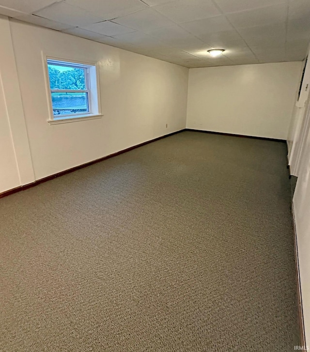 2124 Lakeview Dr, Washington, IN 47501 - carpeted empty room with a drop ceiling and baseboards