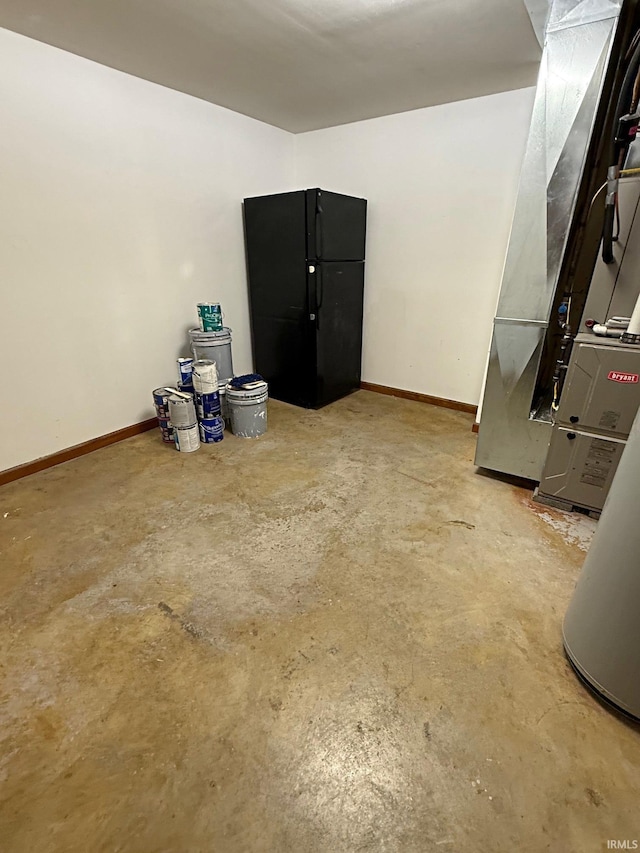 2124 Lakeview Dr, Washington, IN 47501 - below grade area featuring heating unit and baseboards