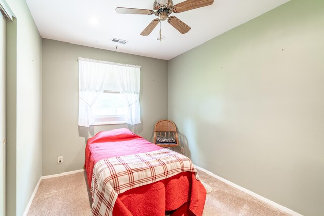 705 W W Spg, Fremont, IN 46737 - bedroom with carpet floors, baseboards, and ceiling fan