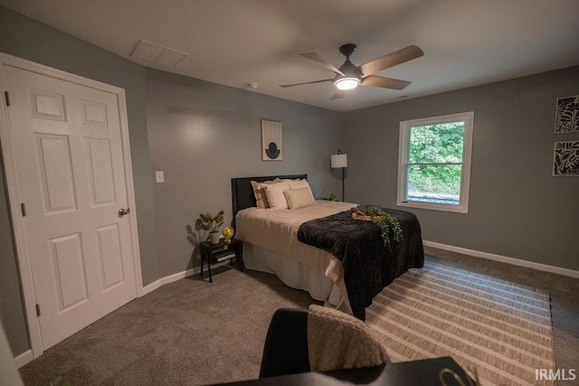 1034 Harter Blvd, Anderson, IN 46011 - carpeted bedroom with baseboards and ceiling fan