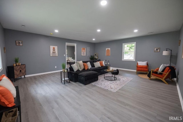 1034 Harter Blvd, Anderson, IN 46011 - living area with recessed lighting, wood finished floors, and baseboards