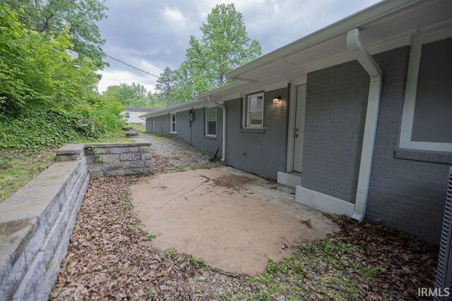 1034 Harter Blvd, Anderson, IN 46011 - view of yard featuring a patio