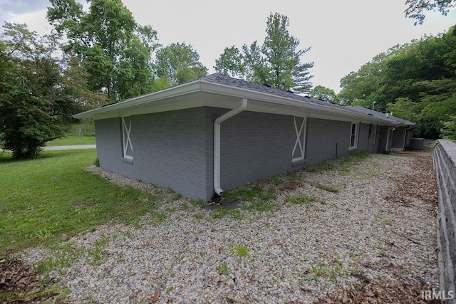 1034 Harter Blvd, Anderson, IN 46011 - view of property exterior with a lawn and brick siding