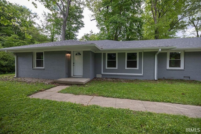1034 Harter Blvd, Anderson, IN 46011 - single story home featuring brick siding and a front yard