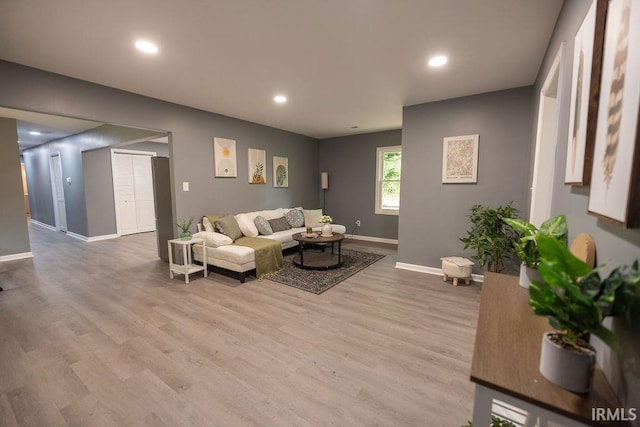 1034 Harter Blvd, Anderson, IN 46011 - living area with wood finished floors, baseboards, and recessed lighting