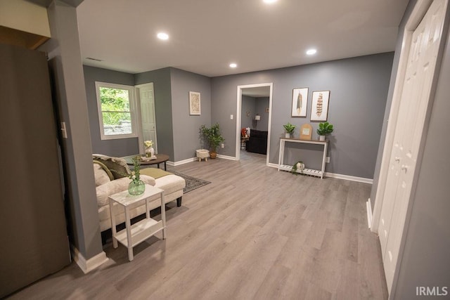 1034 Harter Blvd, Anderson, IN 46011 - living area featuring baseboards, light wood-type flooring, and recessed lighting
