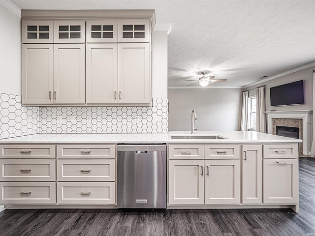 2747 Thornhill Dr, Evansville, IN 47725 - kitchen featuring dishwasher, a peninsula, ornamental molding, a ceiling fan, and light countertops