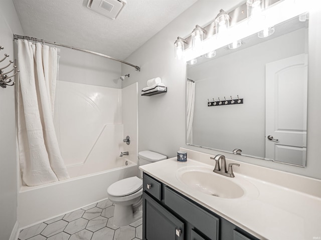 2747 Thornhill Dr, Evansville, IN 47725 - full bath with vanity, shower / tub combo, toilet, and a textured ceiling