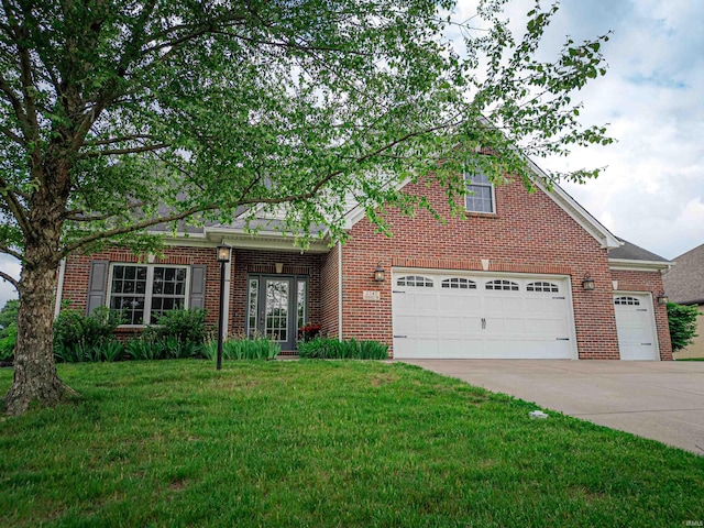 2747 Thornhill Dr, Evansville, IN 47725 - traditional-style house with brick siding, driveway, a front lawn, and a garage