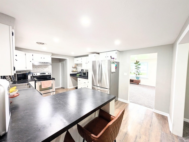 7382 Denise Dr, Fort Wayne, IN 46835 - dining area featuring light wood finished floors, baseboards, and recessed lighting