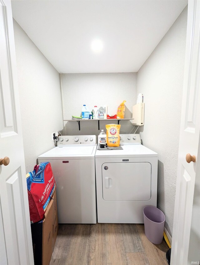 7382 Denise Dr, Fort Wayne, IN 46835 - laundry area with washer and dryer and wood finished floors