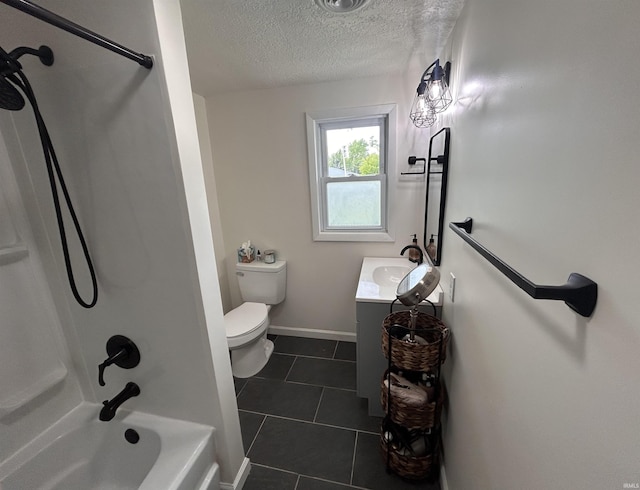 7382 Denise Dr, Fort Wayne, IN 46835 - full bathroom featuring vanity, tile patterned floors, toilet, tub / shower combination, and a textured ceiling