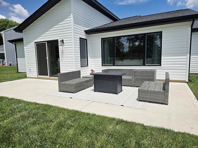 1485 Radomiro Psge, Fort Wayne, IN 46845 - back of property featuring a patio, an outdoor hangout area, and a lawn