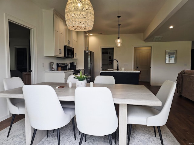 1485 Radomiro Psge, Fort Wayne, IN 46845 - dining room with dark wood-style floors, a chandelier, baseboards, and recessed lighting