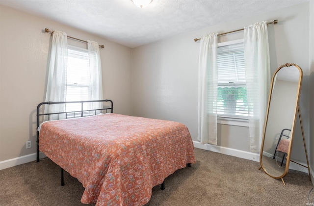 2500 N Govenor St, Evansville, IN 47711 - carpeted bedroom featuring baseboards