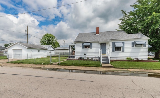 2500 N Govenor St, Evansville, IN 47711 - view of front of property featuring a chimney, a detached garage, and a gate