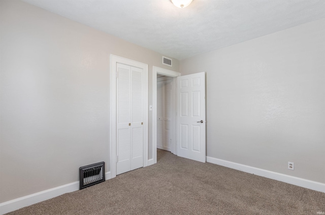 2500 N Govenor St, Evansville, IN 47711 - empty room with carpet and baseboards
