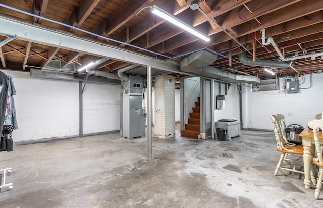 2500 N Govenor St, Evansville, IN 47711 - unfinished below grade area with concrete block wall, stairway, and heating unit