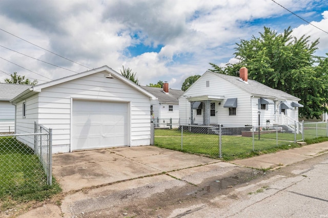 2500 N Govenor St, Evansville, IN 47711 - view of front of property featuring a detached garage and concrete driveway