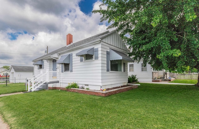 2500 N Govenor St, Evansville, IN 47711 - rear view of property with a chimney and crawl space